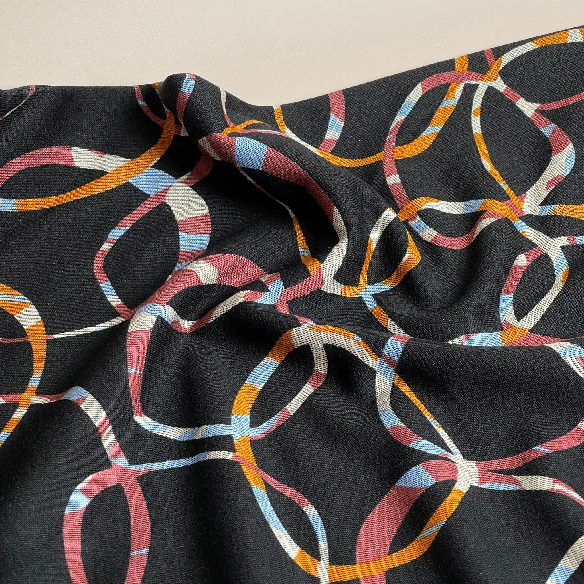 Sunset Loops Soft Ponte Interlock Jersey Fabric